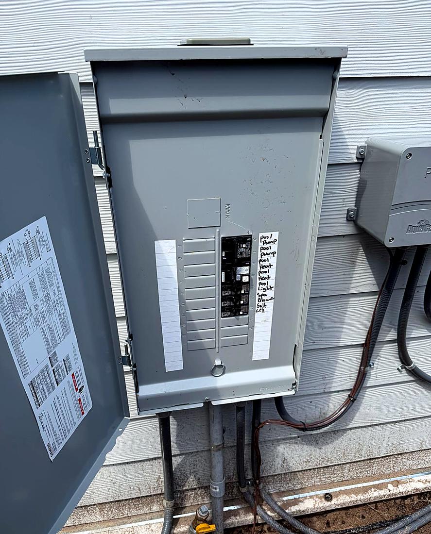 Pool equipment panel with pump, heater and lighting circuits